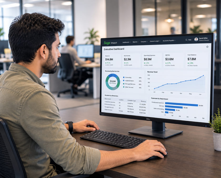 Finance director reviewing a Sage Intacct dashboard image